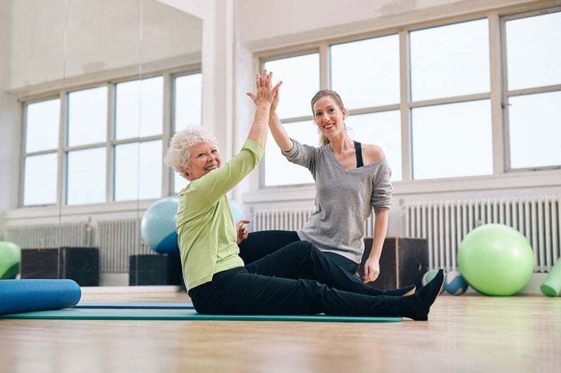 adult women working out how to use cbd for workout recovery.