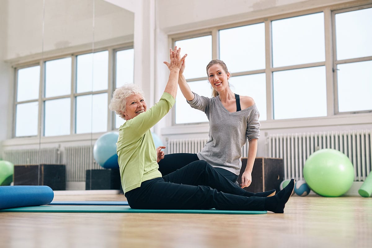 adult women working out how to use cbd for workout recovery.