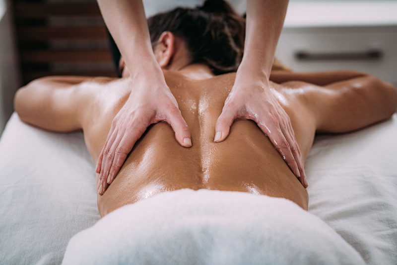 back sports massage therapy. how to use cbd oil for back pain.