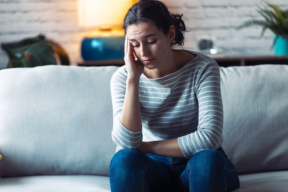 worried young woman thinking. buy cbd oil online usa.